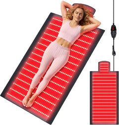 2026 Full Body Red Light Therapy Mat - Woman lying on glowing red mat with controller